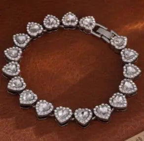 Luxury tennis bracelet and necklace with heart shape and crystals, shiny unisex jewellery gift